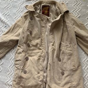 Gorgeous jacket. Feels like corduroy.